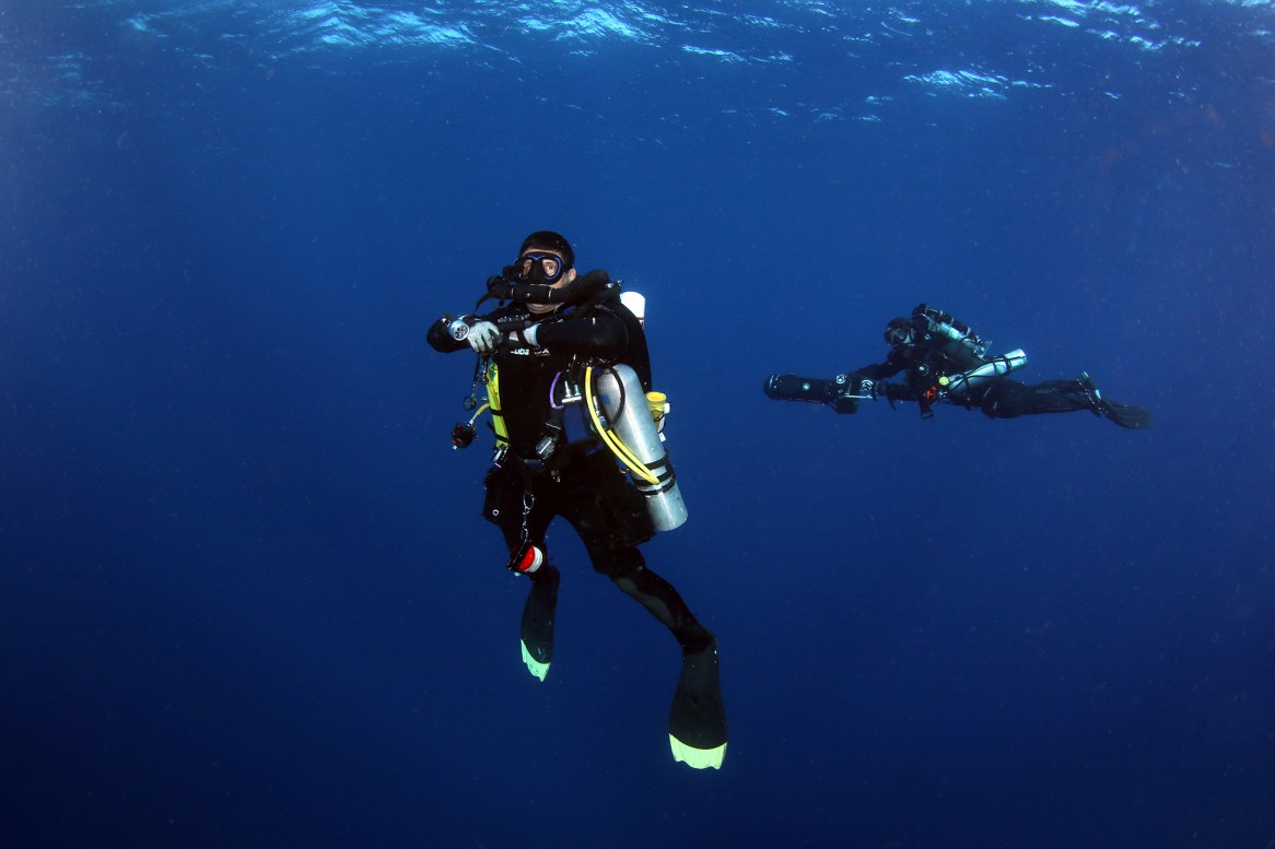The diver squaring his shoulders makes for a more dramatic shot evoking masculinity, while his body/head titled slightly away makes it more interesting than a straight-on pose. Photo courtesy of Michael Rothschild.