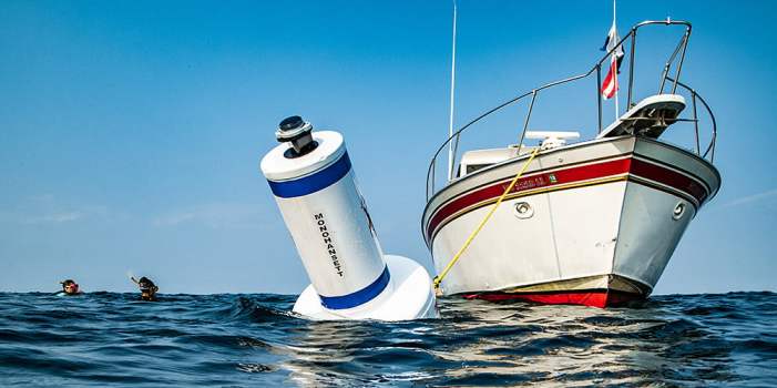 Seasonal mooring buoys can be found on many popular shipwrecks. A bright yellow tag line is attached to the buoy which enables visitors to secure their boats to the buoy and safely visit the shipwreck site. Image: NOAA