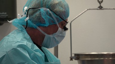 Tom Beaver during an autopsy